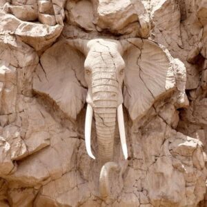 Fototapeta - Rzeźba słonia z Afryki - zwierzęcy motyw rzeźby w jasnym kamieniu