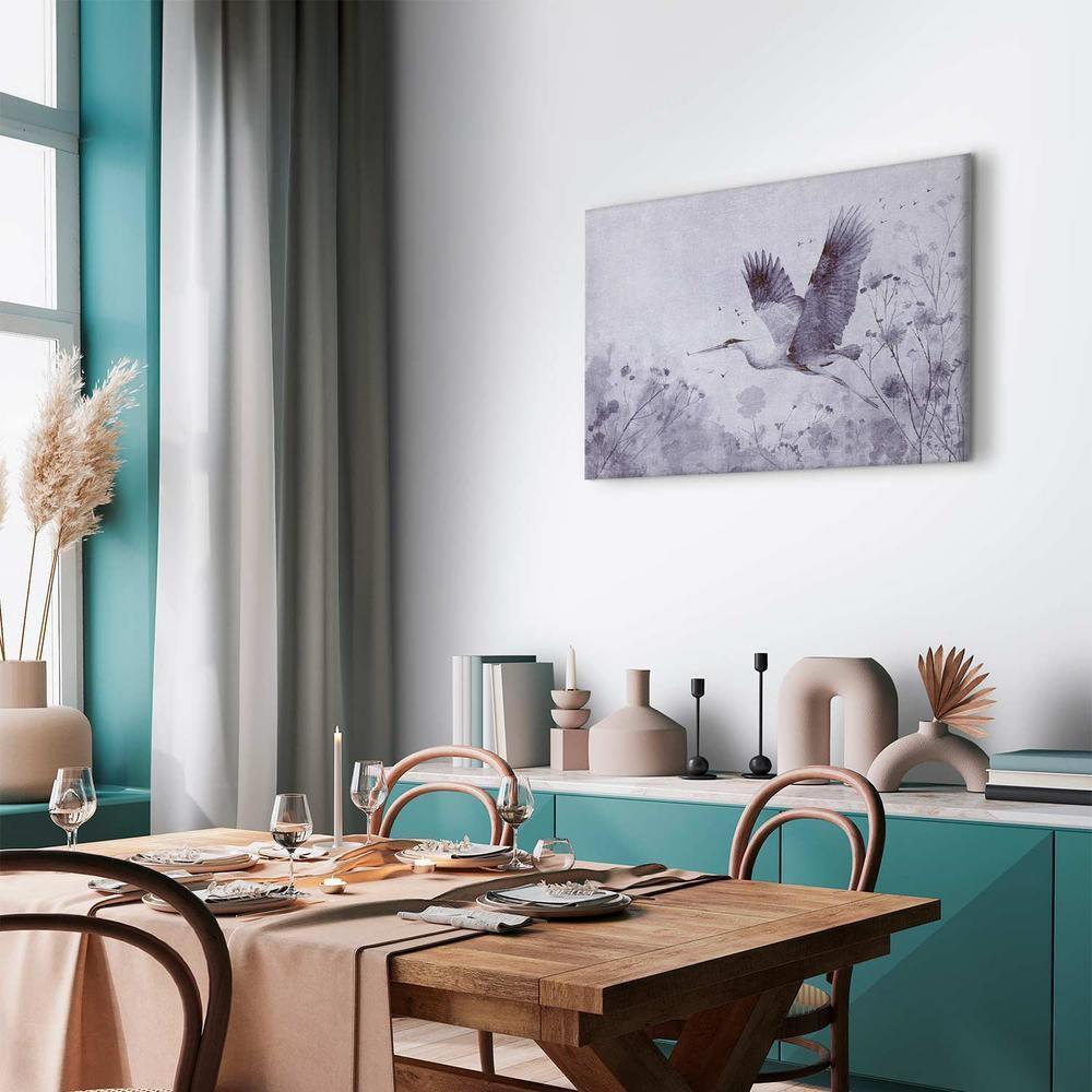 Obraz - Majestatyczny lot - żuraw w locie w monochromatycznej, chłodnej kolorystyce